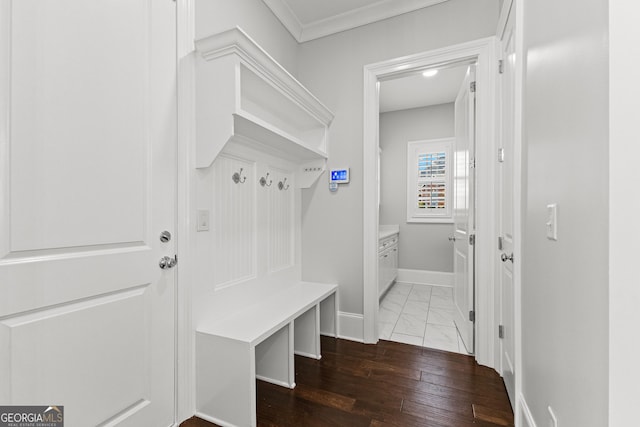 mudroom with hardwood / wood-style flooring and crown molding