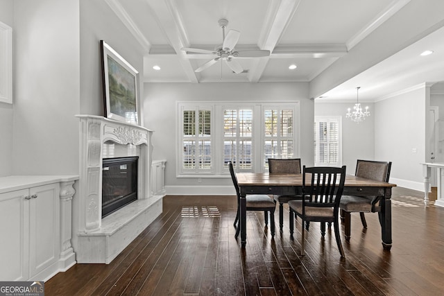 dining space with a fireplace, beam ceiling, ceiling fan with notable chandelier, and dark wood-type flooring