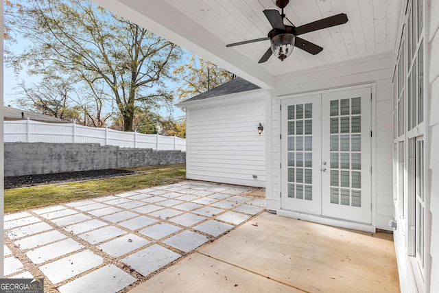 view of patio featuring ceiling fan and french doors