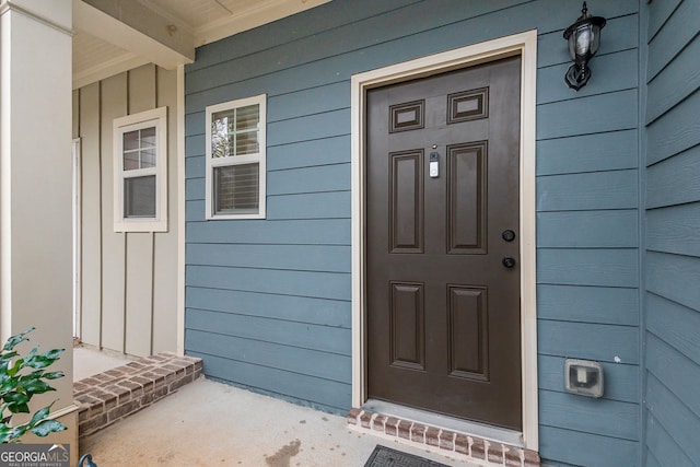 entrance to property with a porch