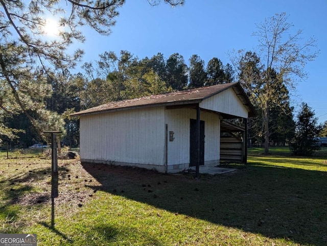 garage with a lawn