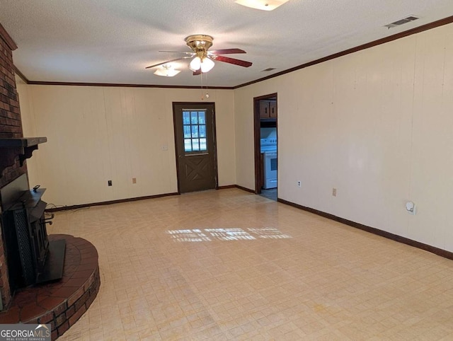 unfurnished living room with ceiling fan, a textured ceiling, and ornamental molding