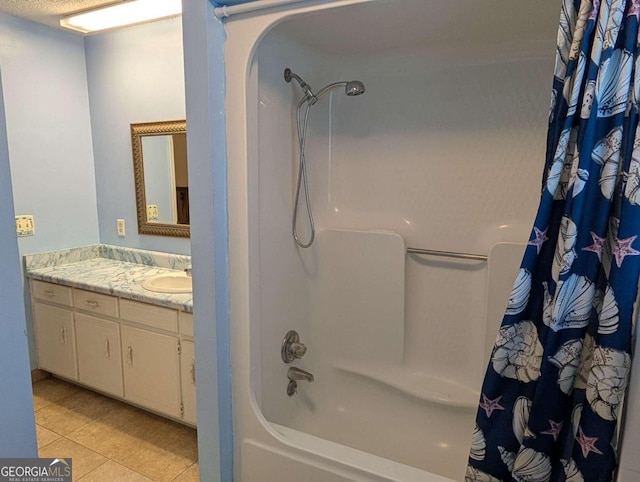 bathroom featuring tile patterned floors, vanity, and shower / bath combination with curtain