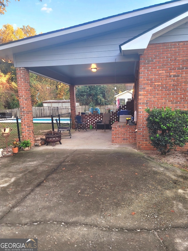 view of property's community with a patio and a pool