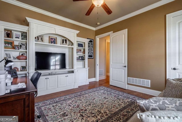 interior space featuring ornamental molding, ceiling fan, and dark wood-type flooring