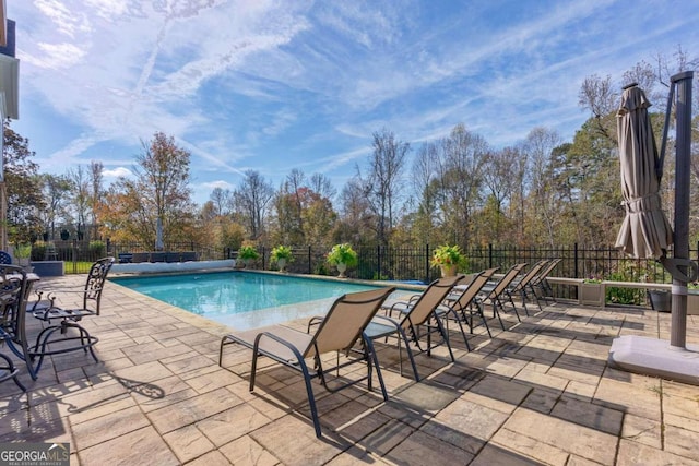 view of pool with a patio