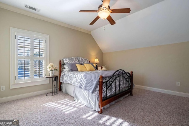 bedroom with carpet, vaulted ceiling, and ceiling fan