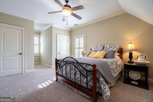 bedroom with ceiling fan, light colored carpet, lofted ceiling, and crown molding