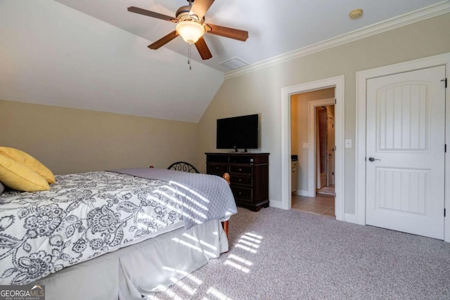 bedroom featuring ceiling fan, light colored carpet, lofted ceiling, and ornamental molding