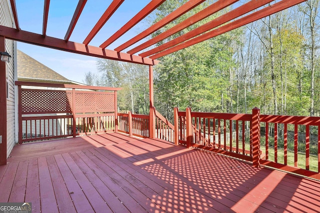 wooden deck with a pergola