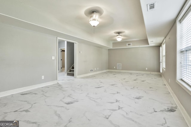 unfurnished room featuring ceiling fan