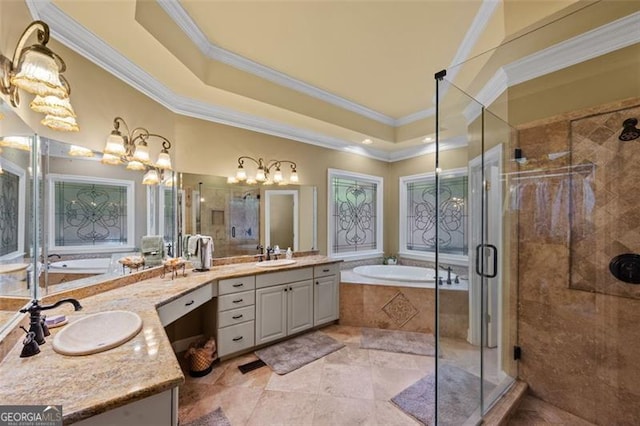 bathroom featuring crown molding, vanity, and independent shower and bath