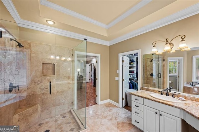 bathroom featuring vanity, wood-type flooring, ornamental molding, and a shower with door