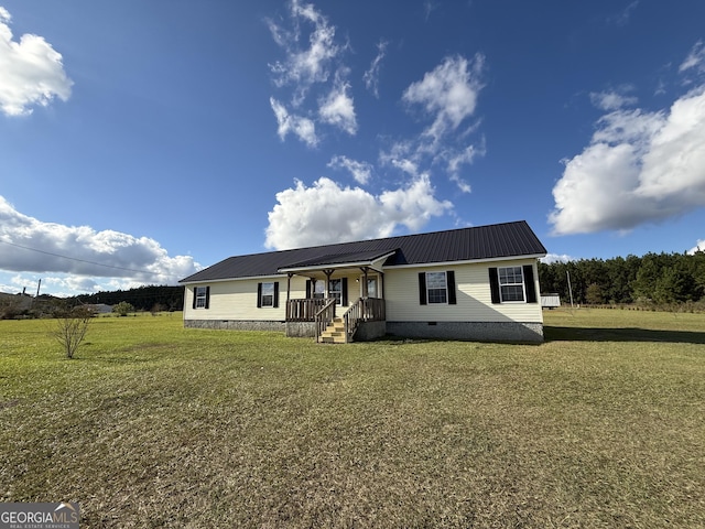 view of front of home with a front yard