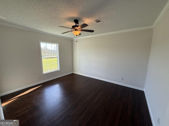 empty room featuring a textured ceiling, ceiling fan, dark hardwood / wood-style floors, and ornamental molding