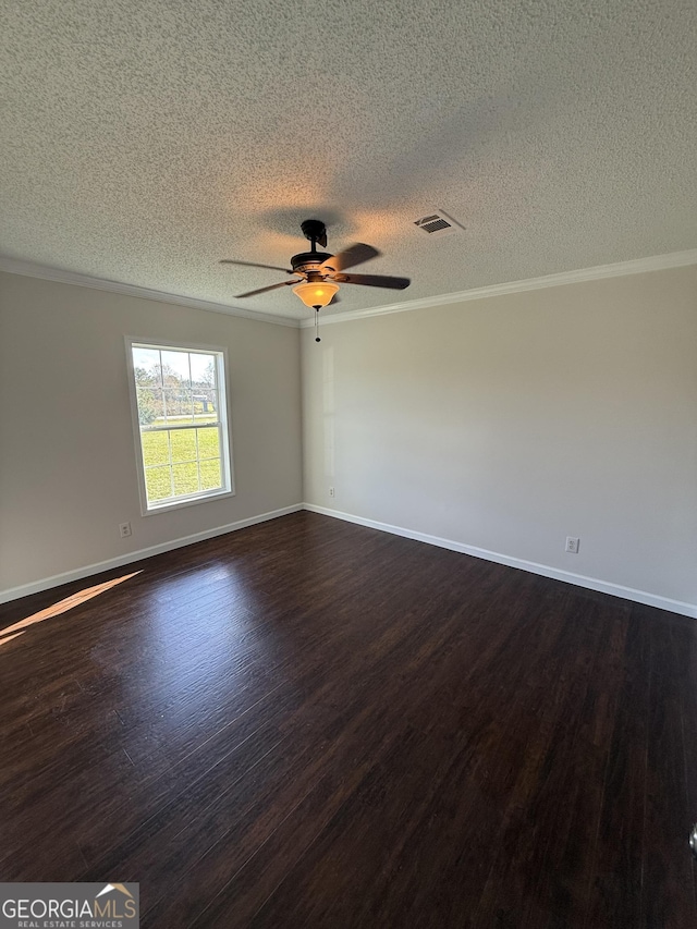 unfurnished room with a textured ceiling, dark hardwood / wood-style flooring, and crown molding