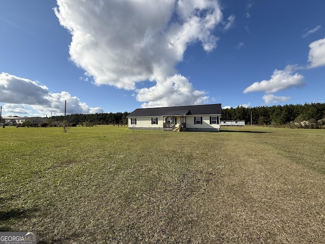 exterior space with a front lawn