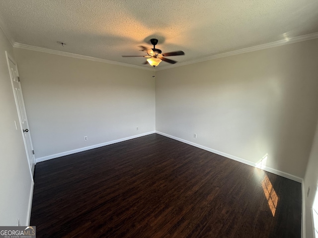 empty room with dark hardwood / wood-style floors, ceiling fan, ornamental molding, and a textured ceiling