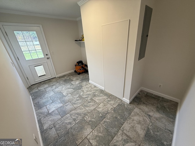 interior space featuring ornamental molding and electric panel