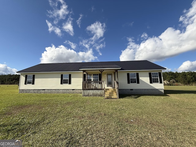 view of front facade with a porch and a front lawn