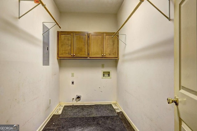 laundry room with cabinets, washer hookup, electric dryer hookup, hookup for a gas dryer, and electric panel