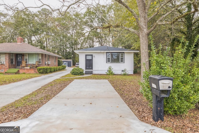 ranch-style home featuring covered porch