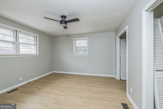 unfurnished bedroom featuring ceiling fan and light hardwood / wood-style floors