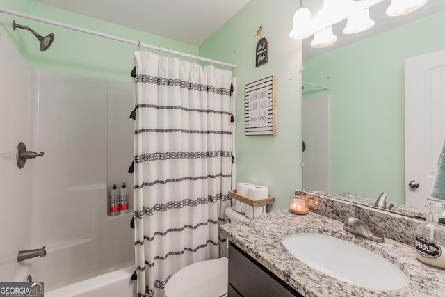 full bathroom featuring vanity, shower / tub combo, and toilet