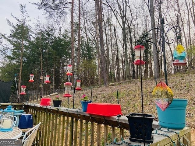 view of jungle gym with a deck