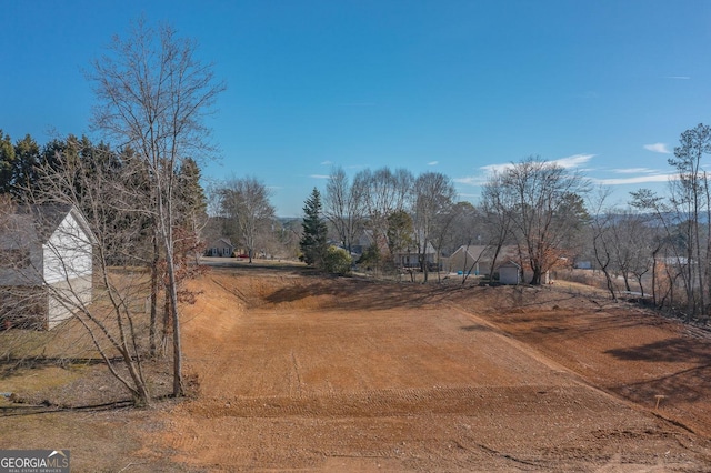 view of yard featuring a rural view