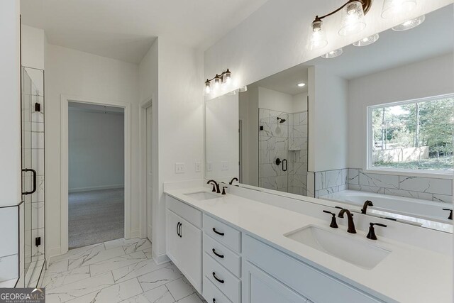 2198 Old Swimming Pool Rd, Jefferson, GA 30549 - full bathroom featuring a shower stall, marble finish floor, a garden tub, and a sink