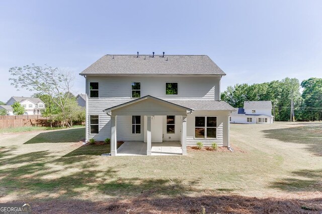 2198 Old Swimming Pool Rd, Jefferson, GA 30549 - back of property with roof with shingles, fence, a yard, and a patio