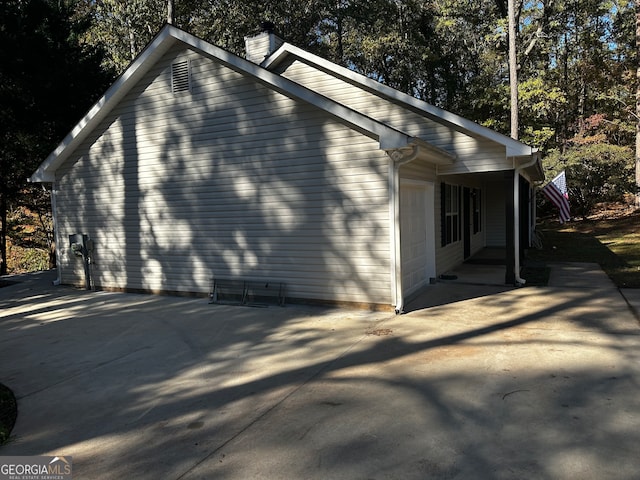 view of property exterior featuring a patio