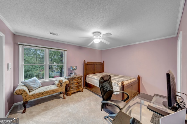 carpeted bedroom featuring ceiling fan, crown molding, and a textured ceiling