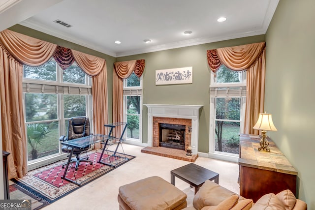 living area with crown molding, a fireplace, and light colored carpet