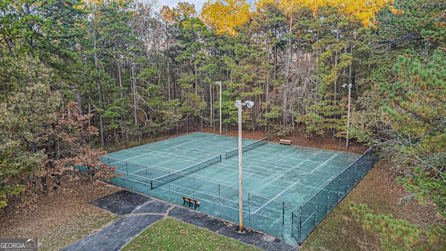 view of basketball court featuring tennis court