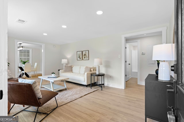 living room featuring light wood-type flooring