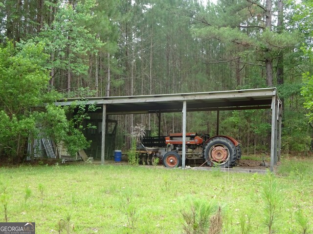 view of outdoor structure with a carport