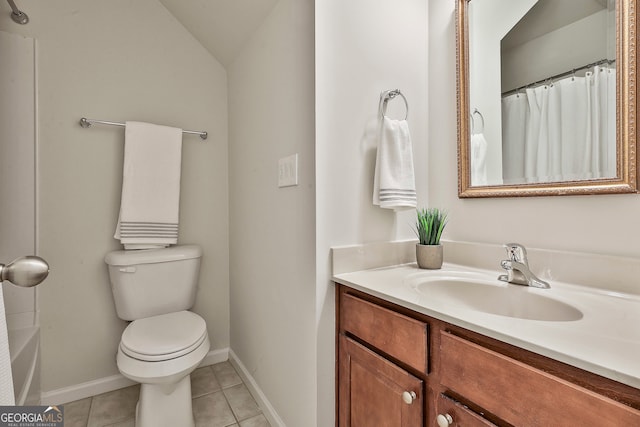 bathroom featuring tile patterned floors, lofted ceiling, toilet, vanity, and a shower with shower curtain