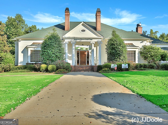 exterior space with a front yard