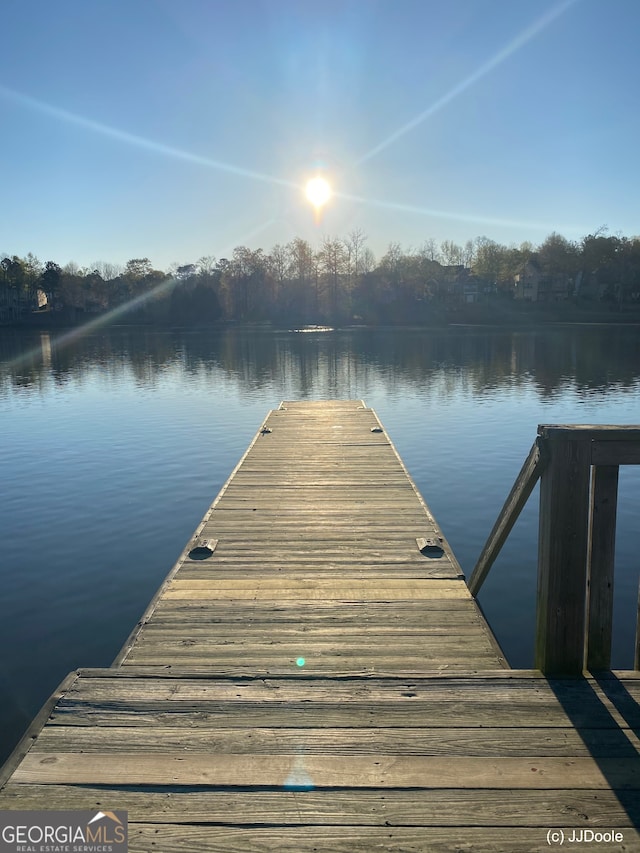 view of dock with a water view