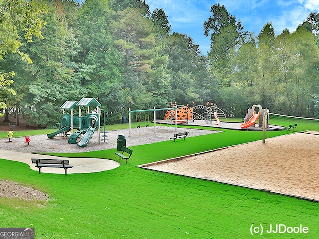 view of play area featuring a lawn