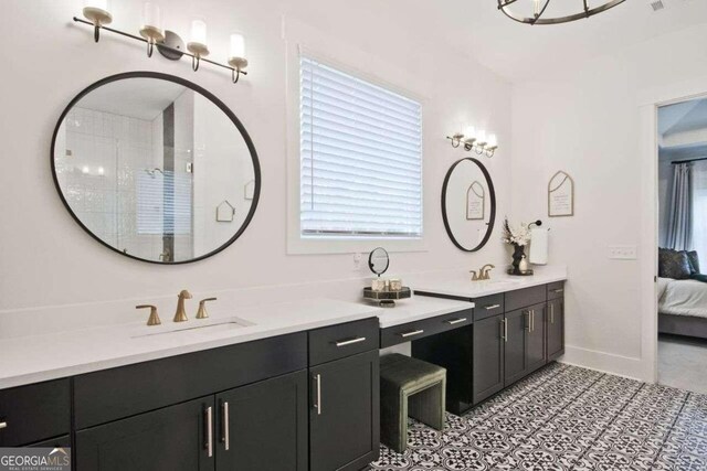 bathroom featuring tile patterned floors and vanity