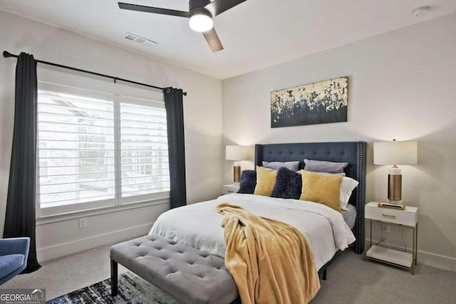 carpeted bedroom with ceiling fan