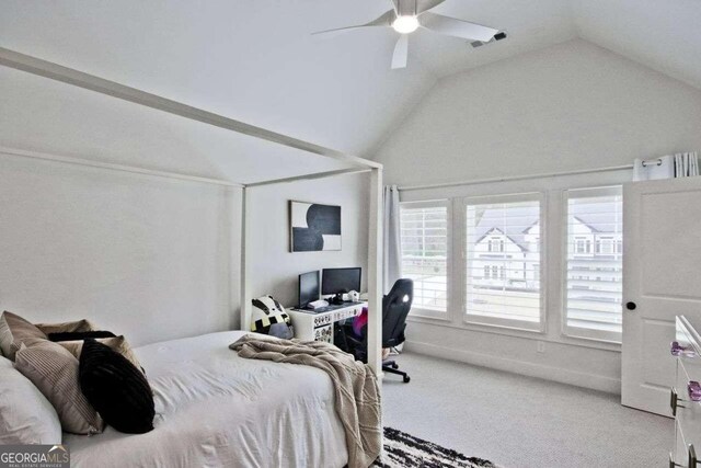 bedroom with carpet, ceiling fan, and lofted ceiling