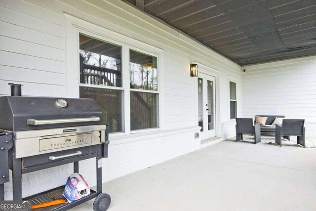 view of patio with covered porch and grilling area