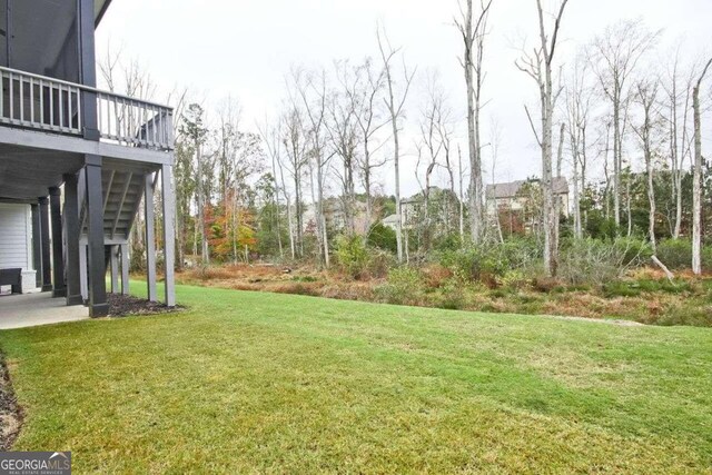 view of yard featuring a deck