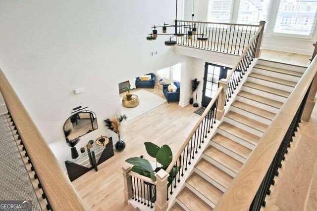 stairway with wood-type flooring