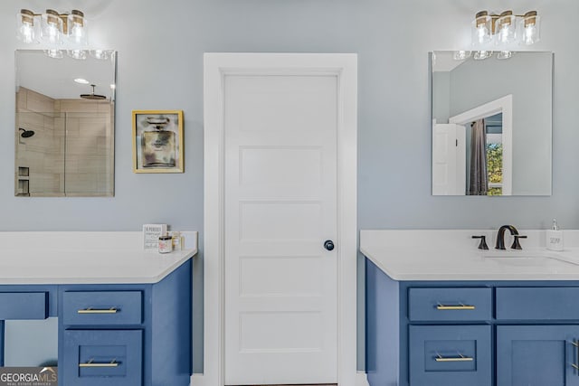 bathroom featuring vanity and tiled shower