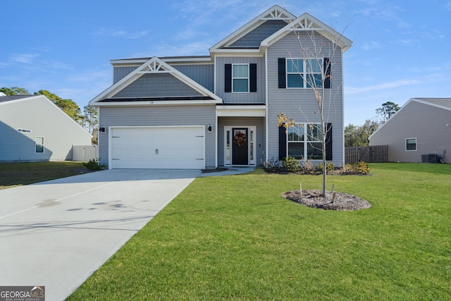 view of front of property with a front yard, a garage, and cooling unit